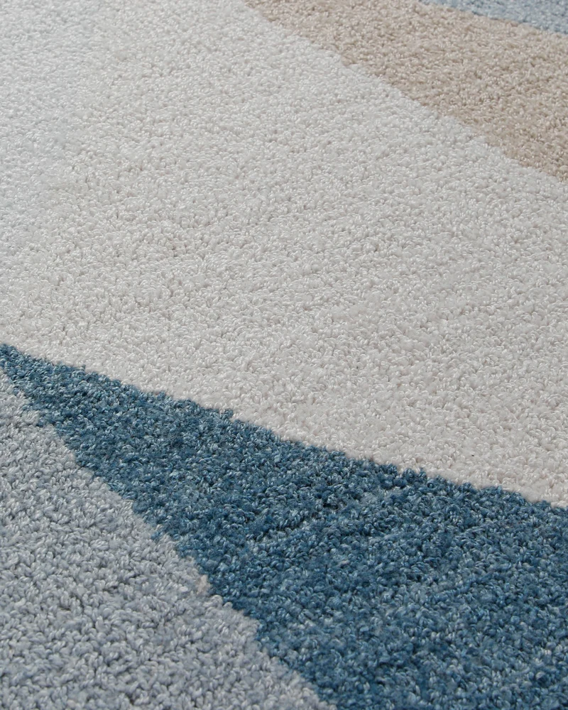 Dreiecke in Eisblau - Handtuft Wolle 160 x 230 cm
